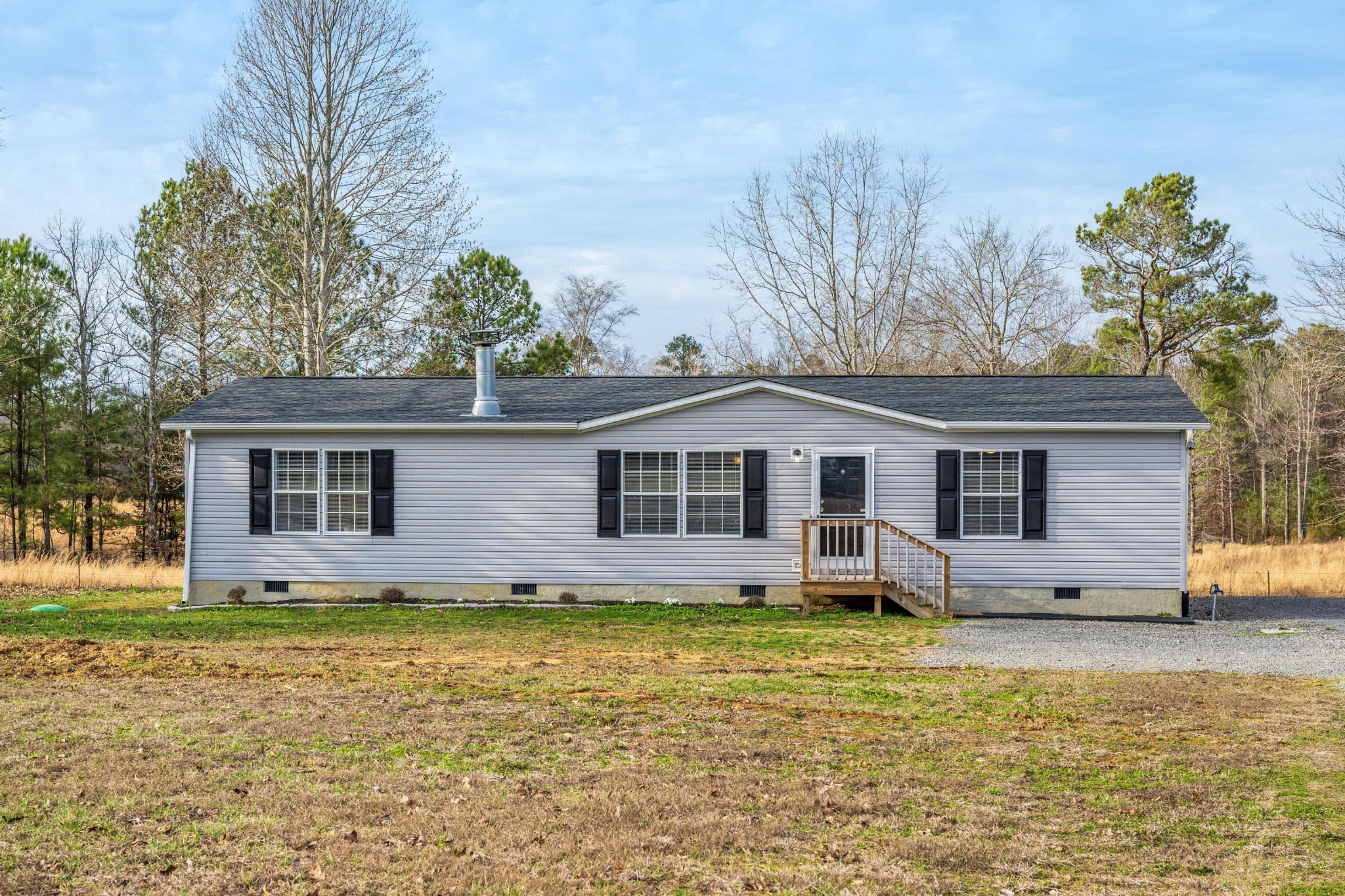 720 Armstrong Road Southeast Cleveland, TN 37323 - Photo 2 of 16 a front view of house with yard and trees around