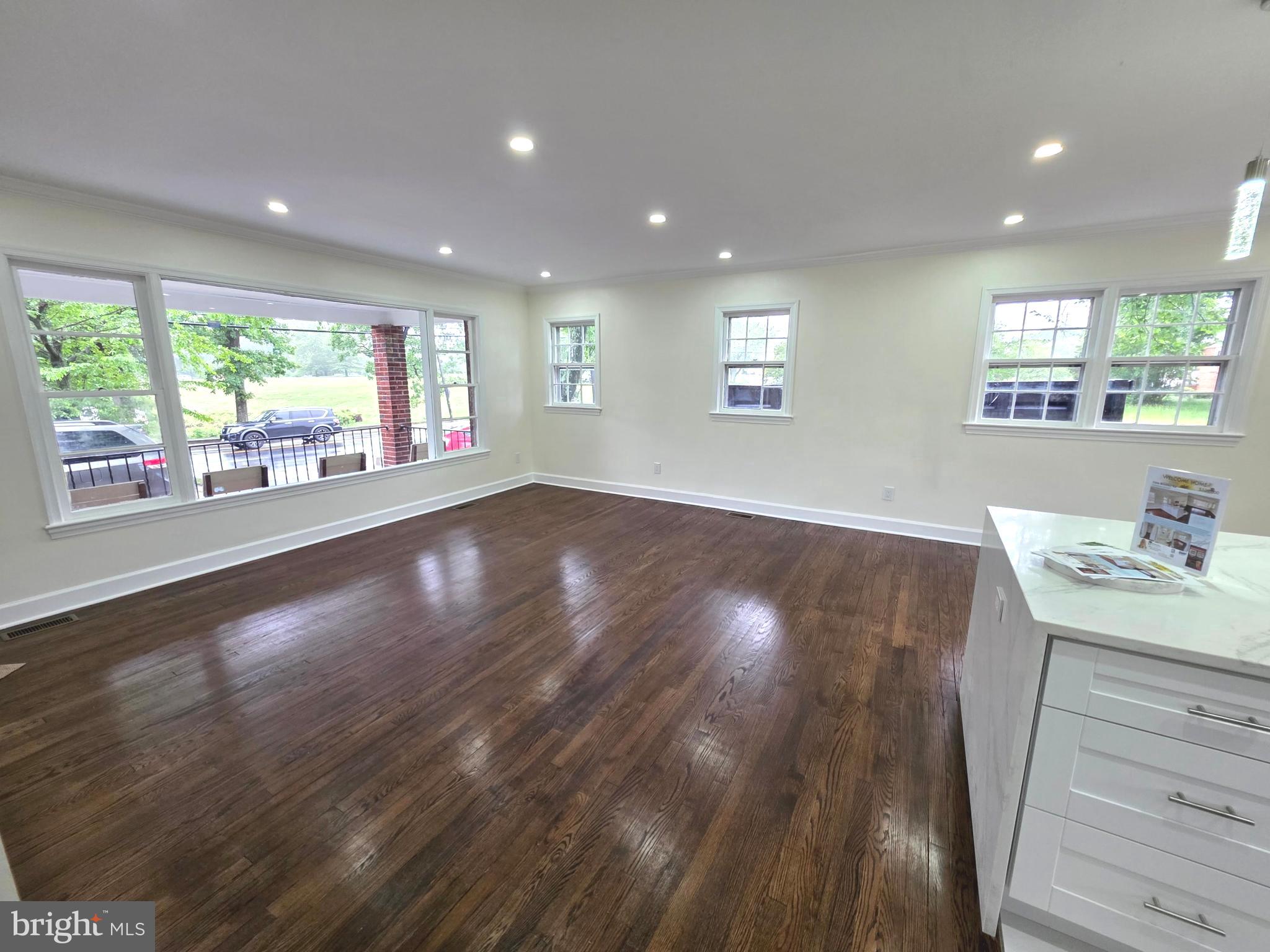 2206 Brinkley Road Fort Washington, MD 20744 - Photo 40 of 78 a view of a room with window and wooden floor