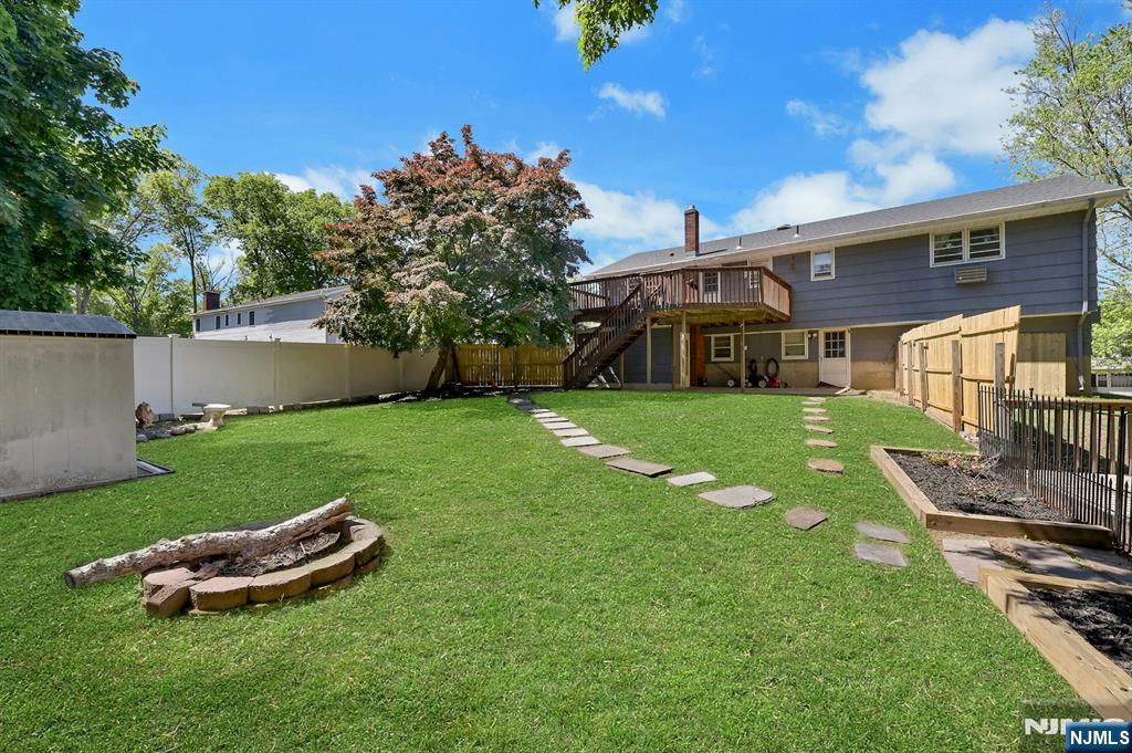 20 Blue Hill Road Norwood, NJ 07648 - Photo 49 of 49 a view of a house with a backyard porch and sitting area