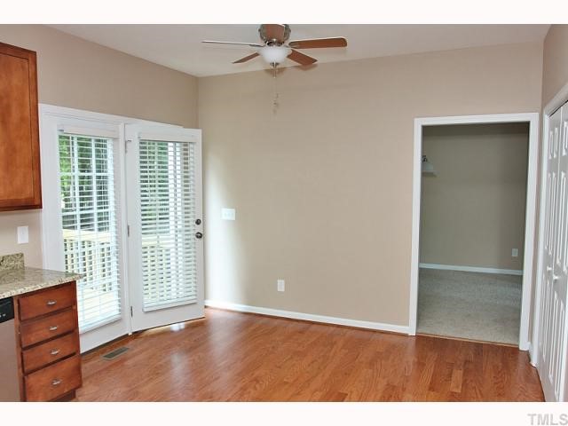 4320 Bartholomew Circle Raleigh, NC 27604 - Photo 3 of 11 an empty room with windows and fan