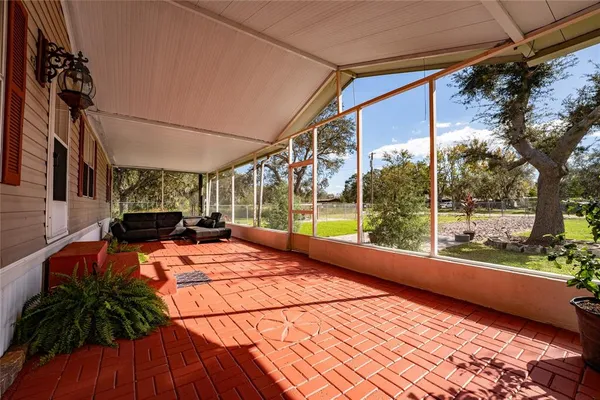 a view of porch with a patio