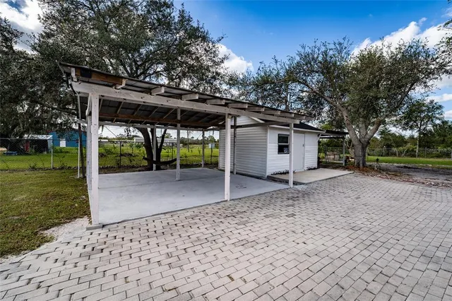 a view of a barn with a yard