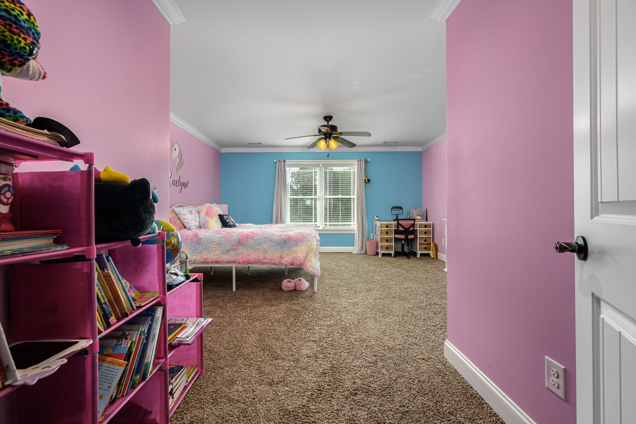 2065 Turkey Creek Loop Tullahoma, TN 37388 - Photo 30 of 95 a bed room with a bed and a book shelf