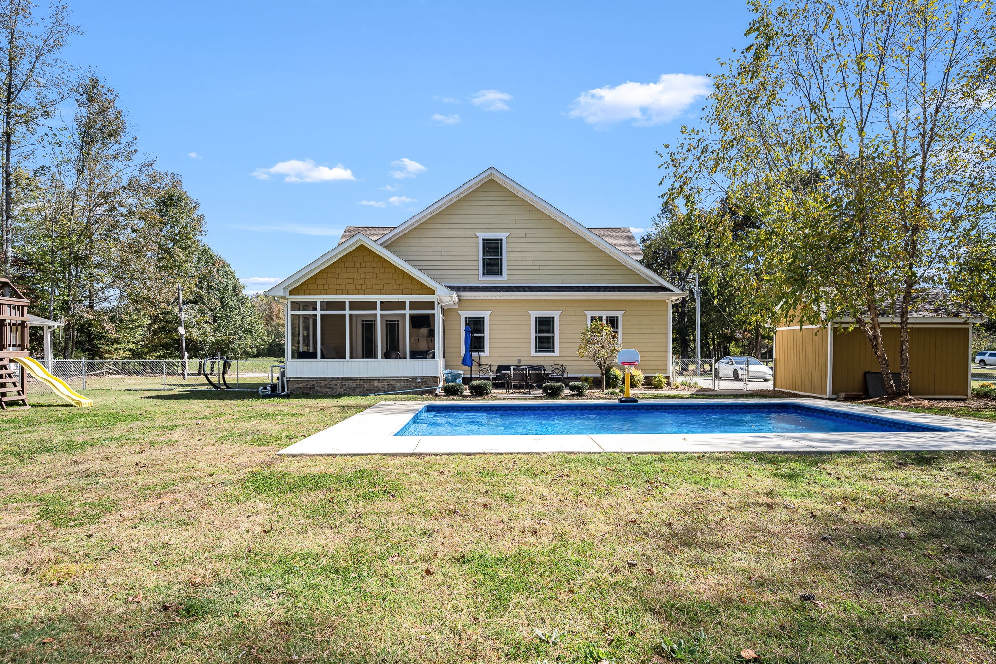 2065 Turkey Creek Loop Tullahoma, TN 37388 - Photo 57 of 95 a front view of house with yard and swimming pool