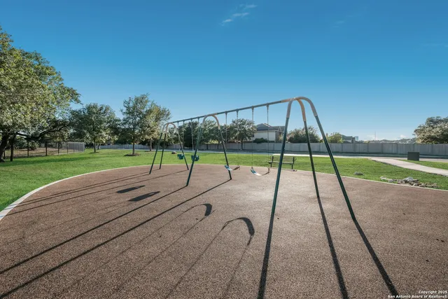 a view of yard with swimming pool