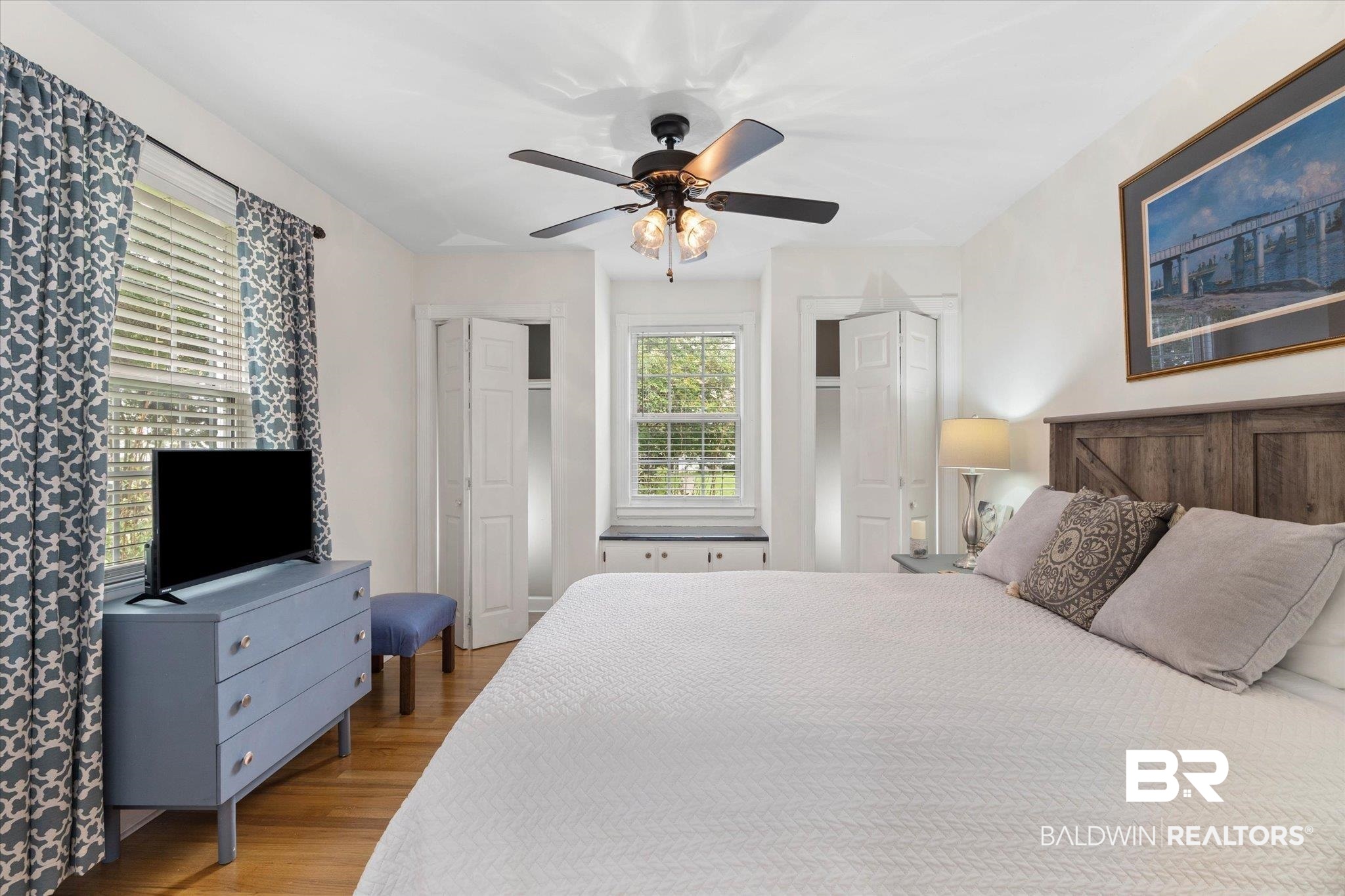 214 Upham Street, Unit 18A Mobile, AL 36607 - Photo 14 of 29 Bedroom featuring wood finished floors and ceiling fan