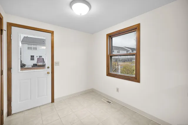 an empty room that has a window