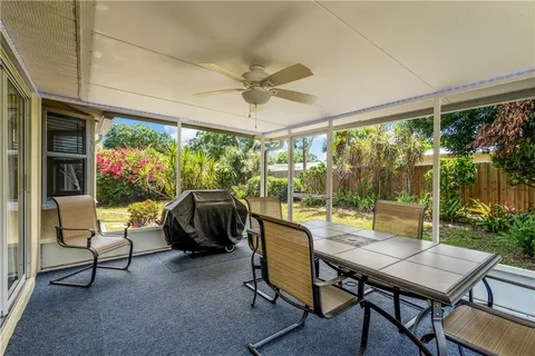 a view of a patio with a yard