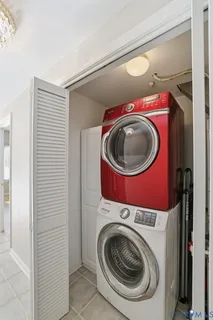 a refrigerator freezer sitting inside of a kitchen