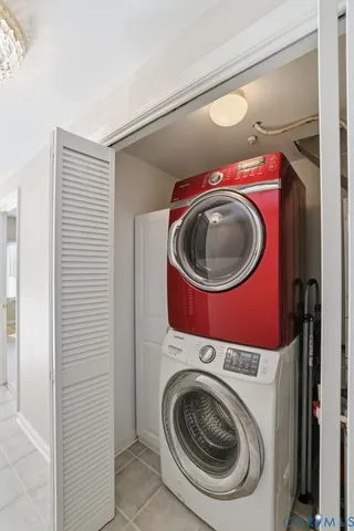 a refrigerator freezer sitting inside of a kitchen