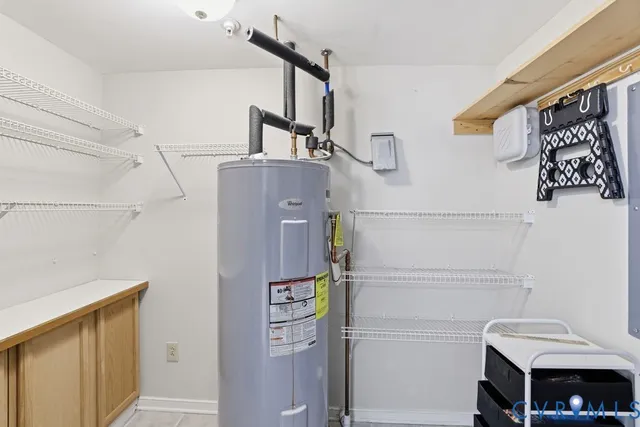 a view of a white building with a large window