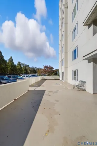 a view of a tall building with many windows