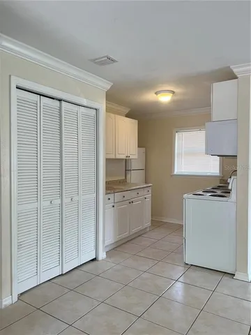 a kitchen with a cabinets