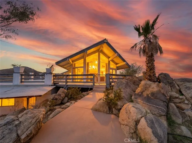 a view of a house with a swimming pool