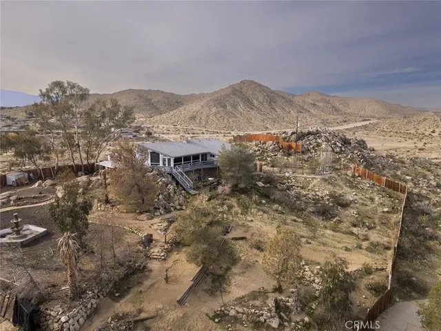 a view of water with a mountain