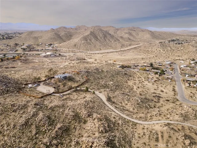 a view of a storage & utility room with a sink