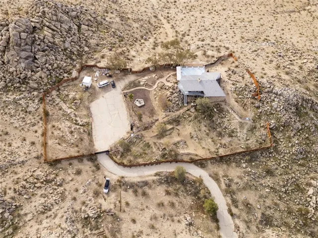 a view of a livingroom with wooden cabinets