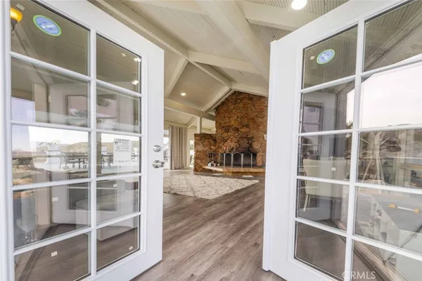 a view of a building from a glass door