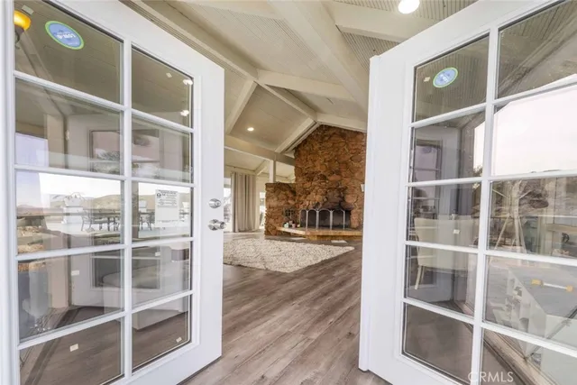 a view of a building from a glass door