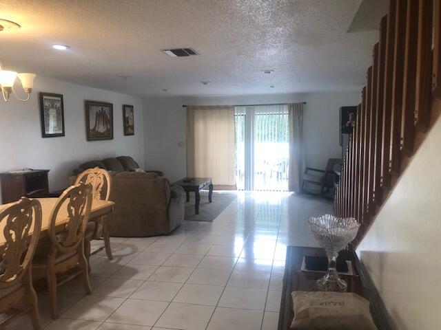 22065 Las Brisas Circle, Unit 401 Boca Raton, FL 33433 - Photo 2 of 21 the dining and living room