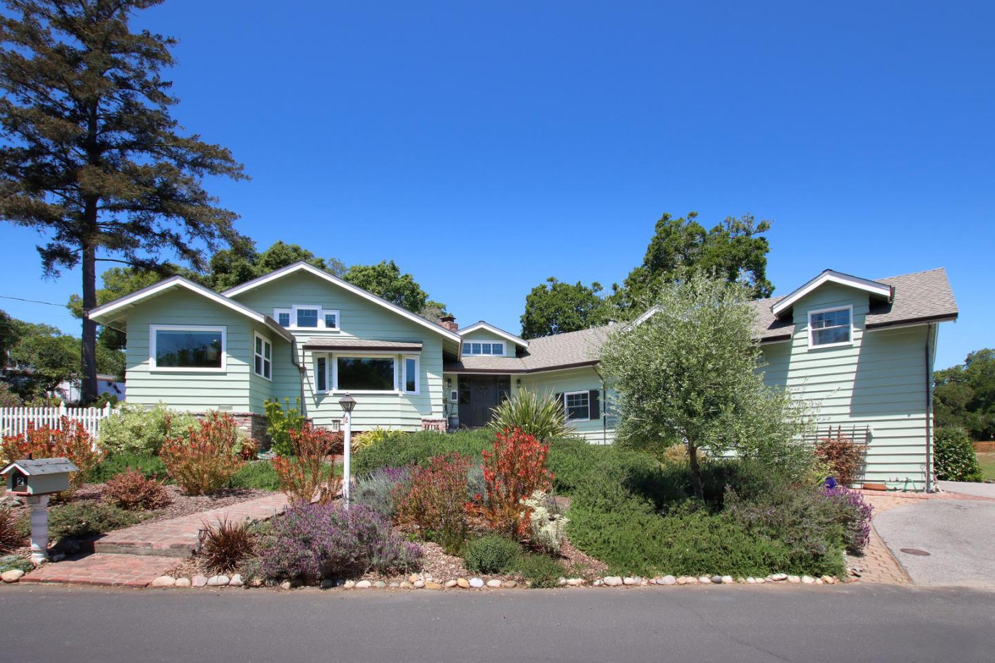 front view of a house with a street