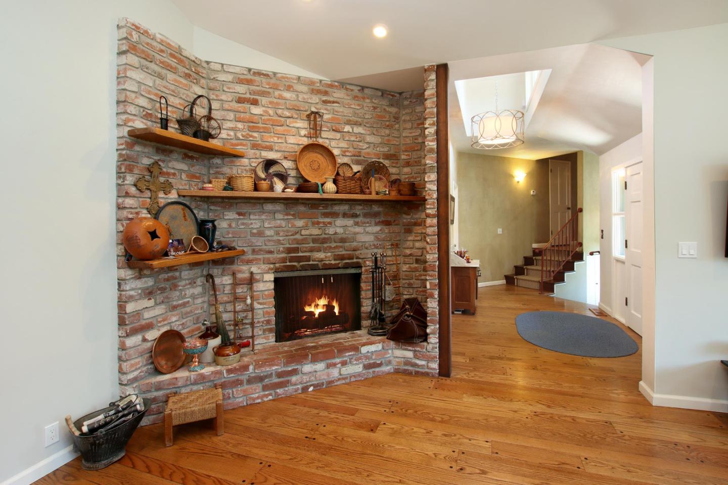 2 Deer Path Road Santa Cruz, CA 95060 - Photo 20 of 44 a living room with furniture and a fireplace