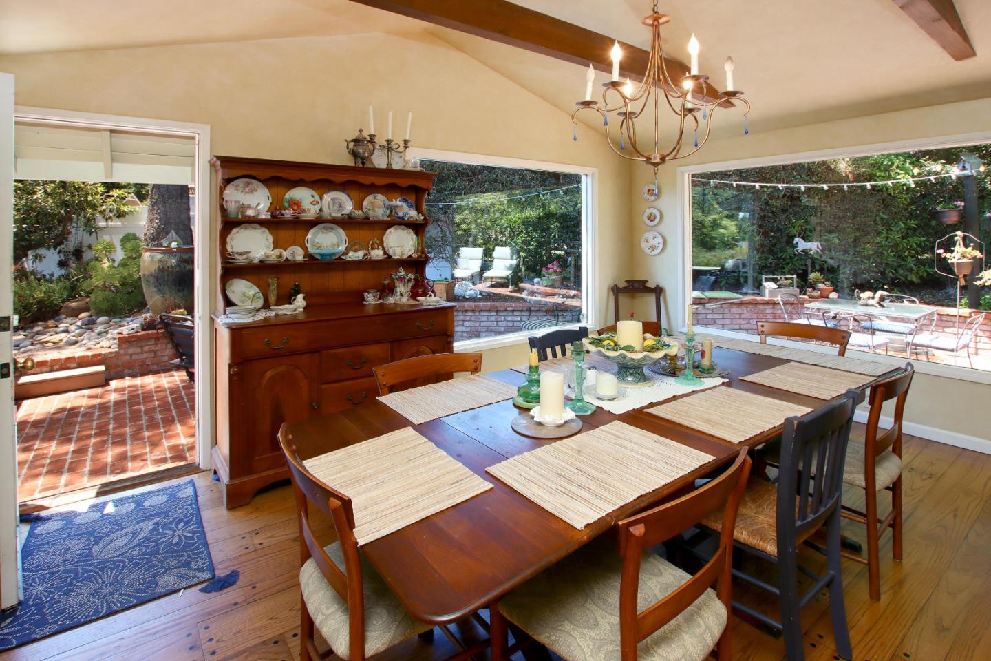 2 Deer Path Road Santa Cruz, CA 95060 - Photo 23 of 44 a view of a dining room with furniture wooden floor and chandelier