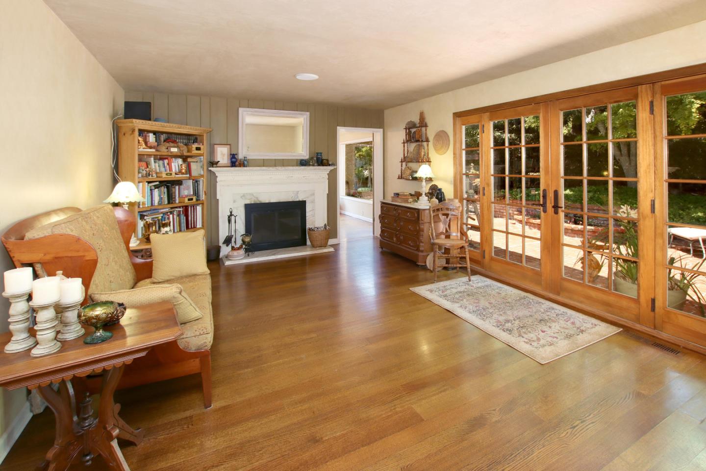 2 Deer Path Road Santa Cruz, CA 95060 - Photo 24 of 44 a living room with furniture large window and a fireplace