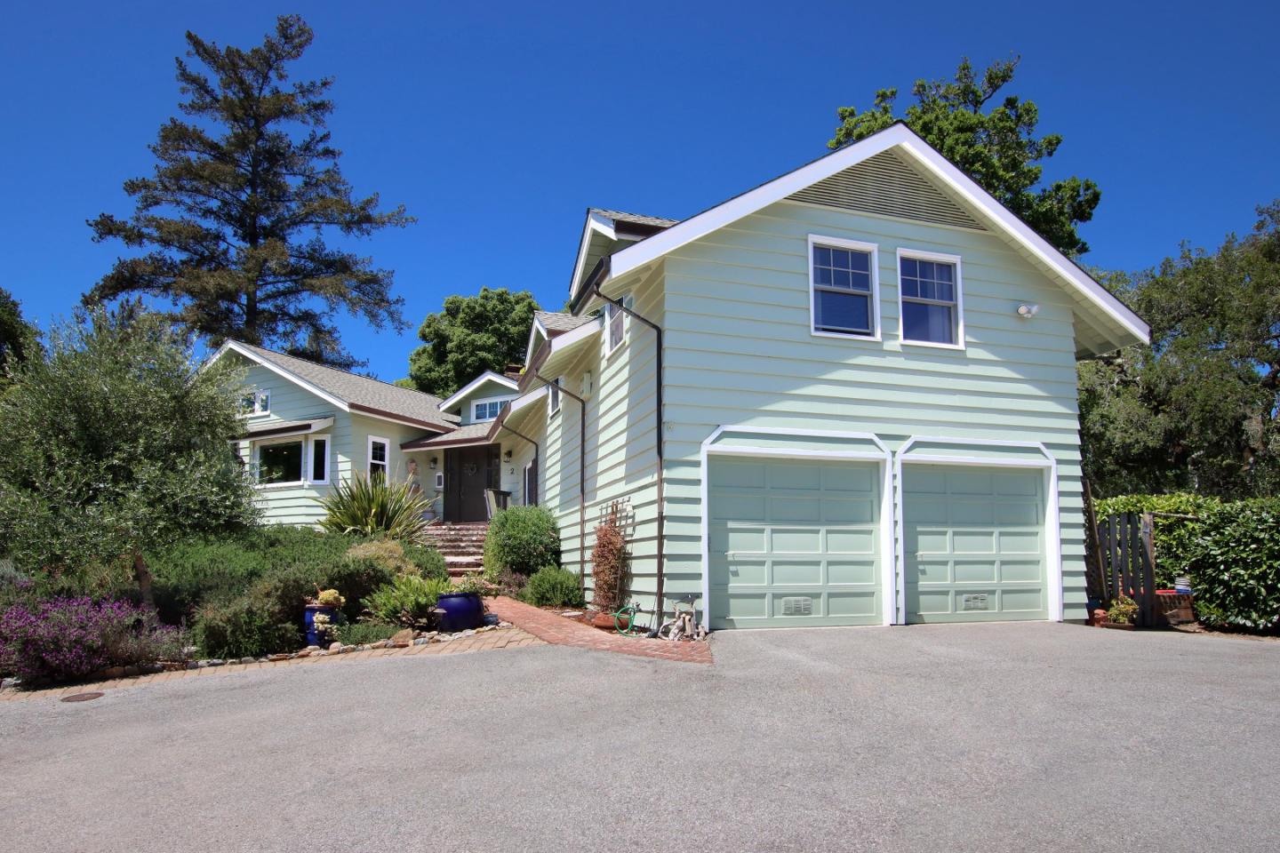 2 Deer Path Road Santa Cruz, CA 95060 - Photo 3 of 44 a front view of a house with a yard and garage