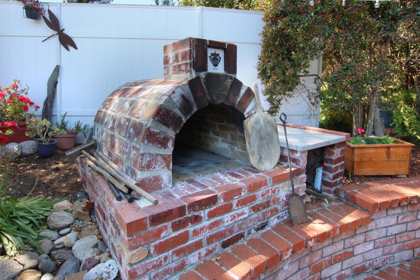 2 Deer Path Road Santa Cruz, CA 95060 - Photo 36 of 44 a front view of a house with outdoor seating