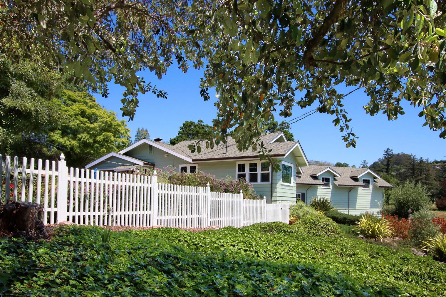 2 Deer Path Road Santa Cruz, CA 95060 - Photo 5 of 44 a front view of a house with a garden