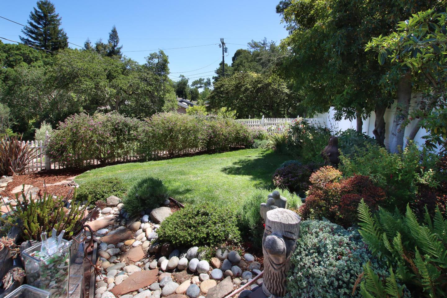 2 Deer Path Road Santa Cruz, CA 95060 - Photo 9 of 44 a view of a garden with a flower in a garden