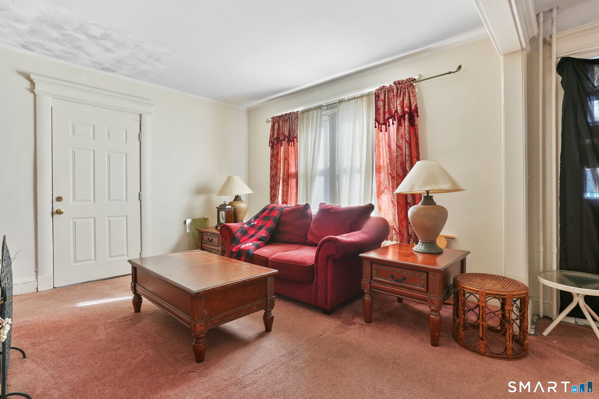 570 Broadview Terrace Hartford, CT 06106 - Photo 11 of 30 a living room with furniture and a window