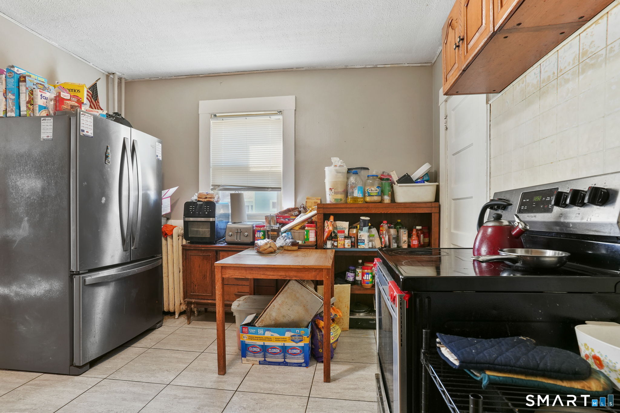 570 Broadview Terrace Hartford, CT 06106 - Photo 22 of 30 a kitchen with stainless steel appliances granite countertop a refrigerator and a stove top oven
