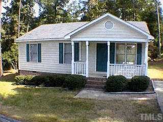 4316 Bluewing Road Raleigh, NC 27616 - Photo 1 of 1 a front view of a house with a yard