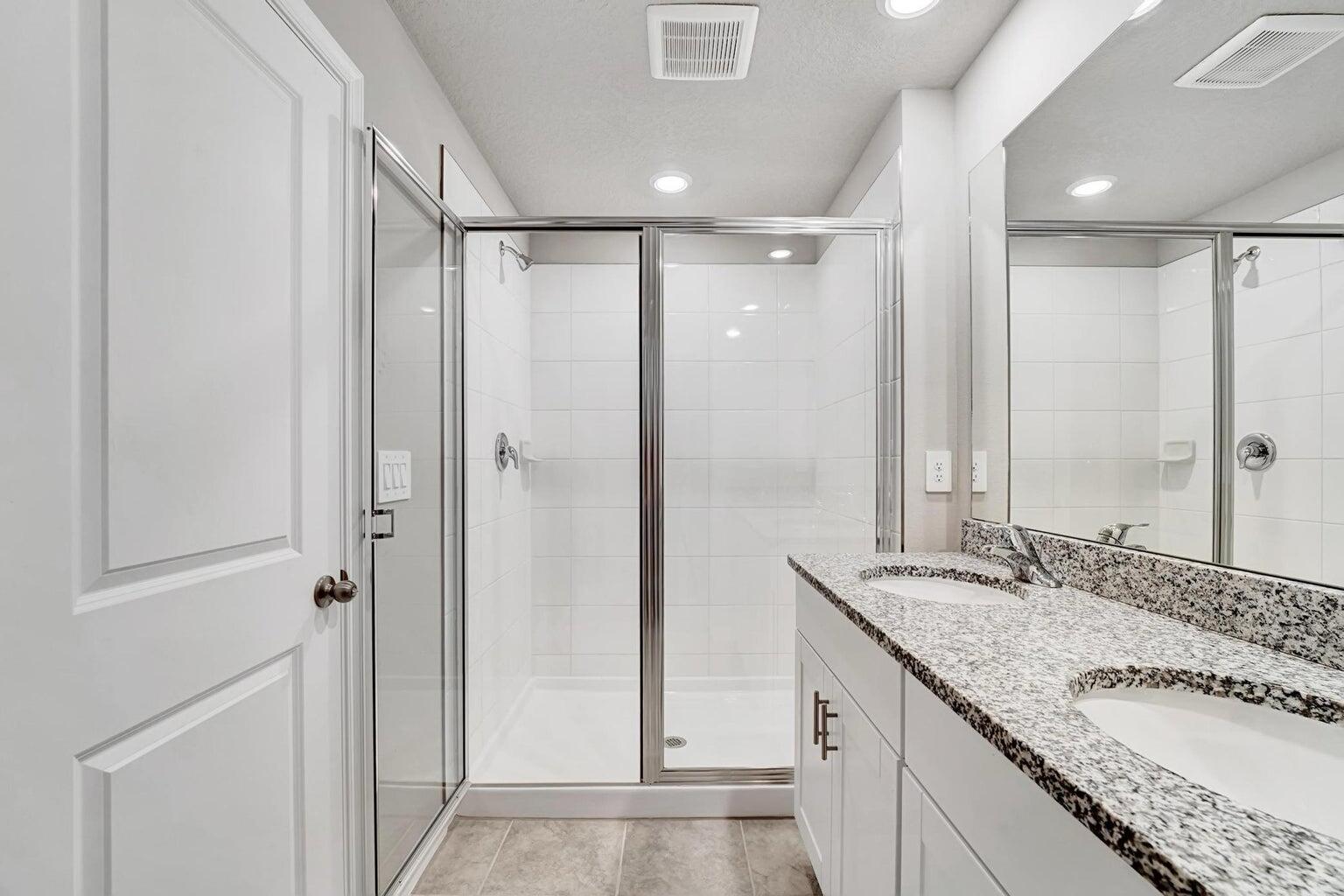 5748 Southeast Edgewater Circle Stuart, FL 34997 - Photo 13 of 36 Primary Bathroom