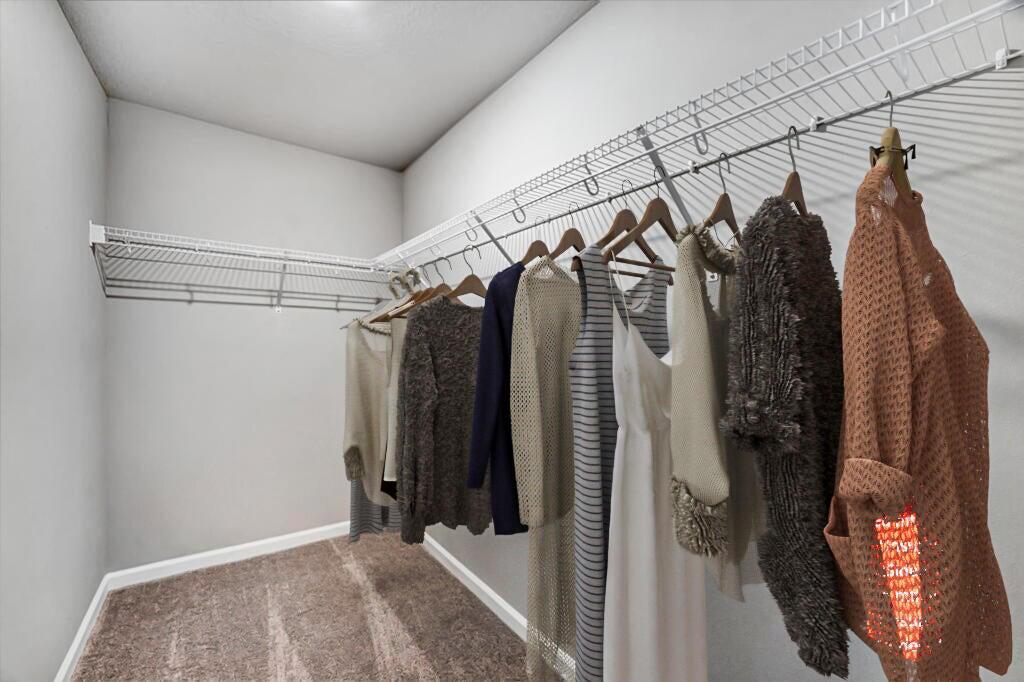 5748 Southeast Edgewater Circle Stuart, FL 34997 - Photo 15 of 36 Primary Walk-in Closet