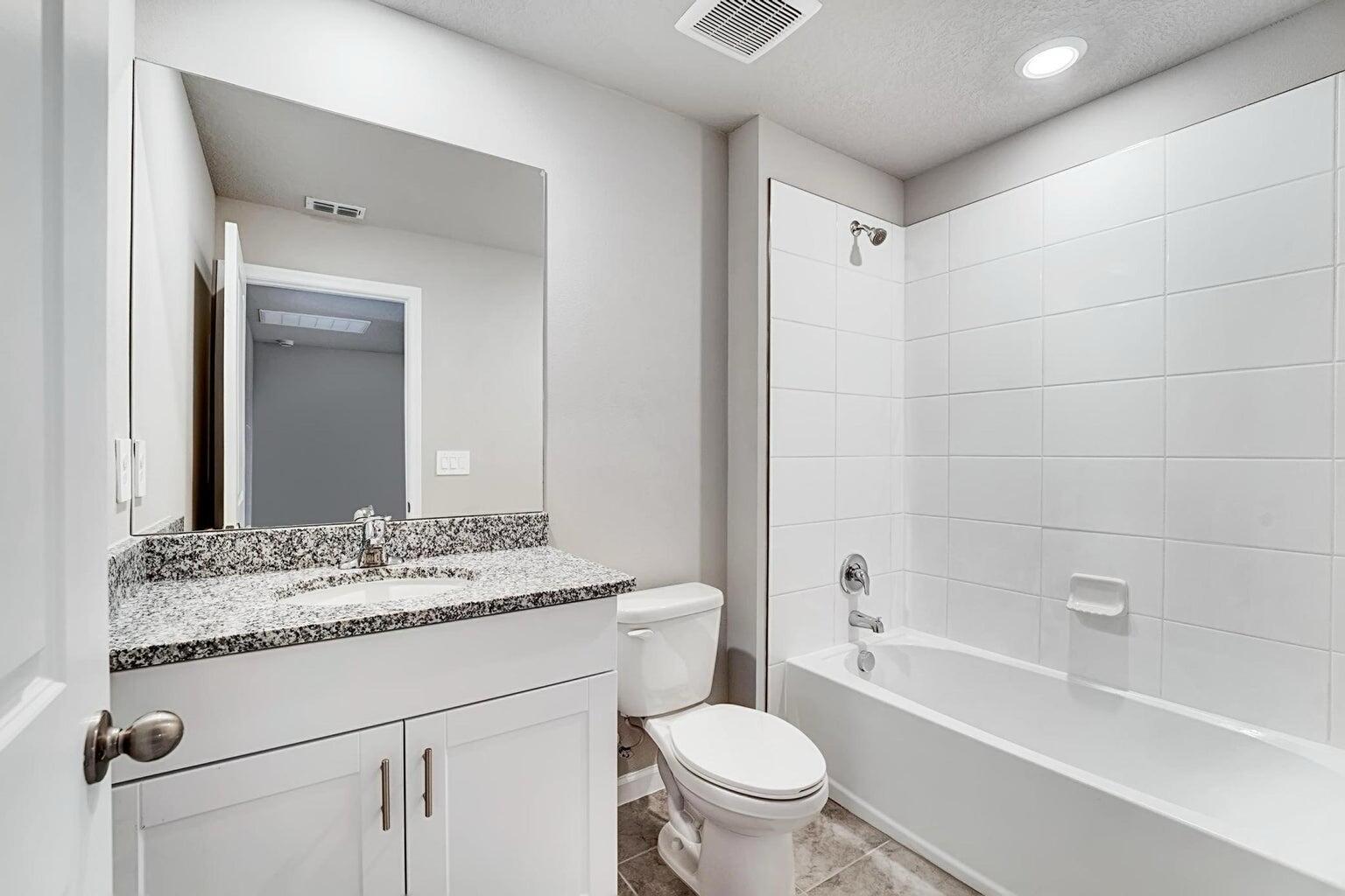 5748 Southeast Edgewater Circle Stuart, FL 34997 - Photo 18 of 36 Upstairs bathroom