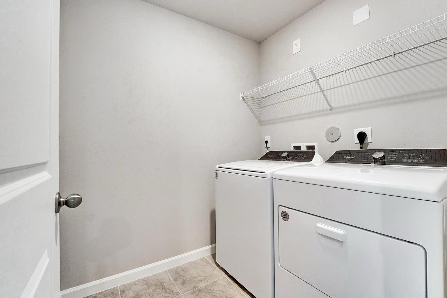 5748 Southeast Edgewater Circle Stuart, FL 34997 - Photo 19 of 36 Laundry Room Upstairs