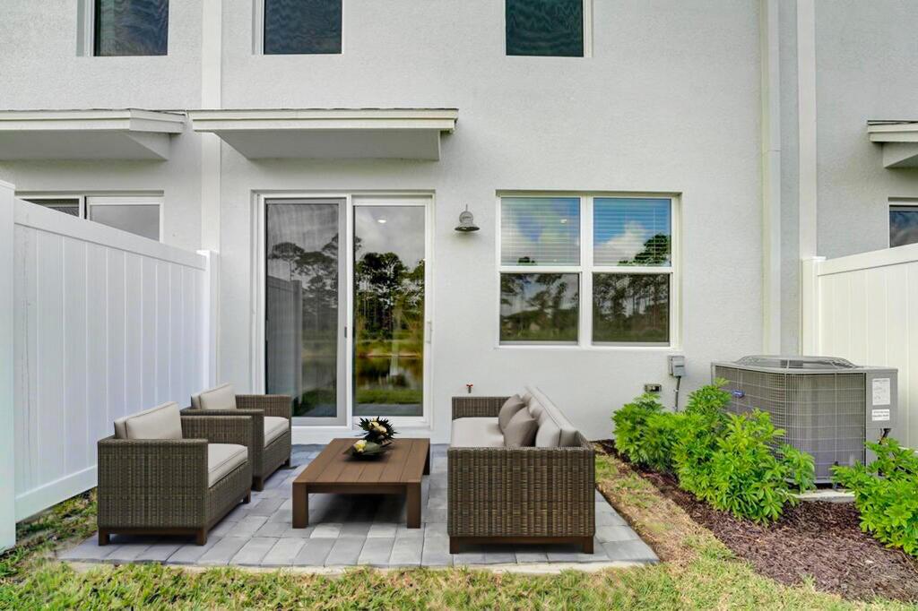 5748 Southeast Edgewater Circle Stuart, FL 34997 - Photo 21 of 36 backyard porch