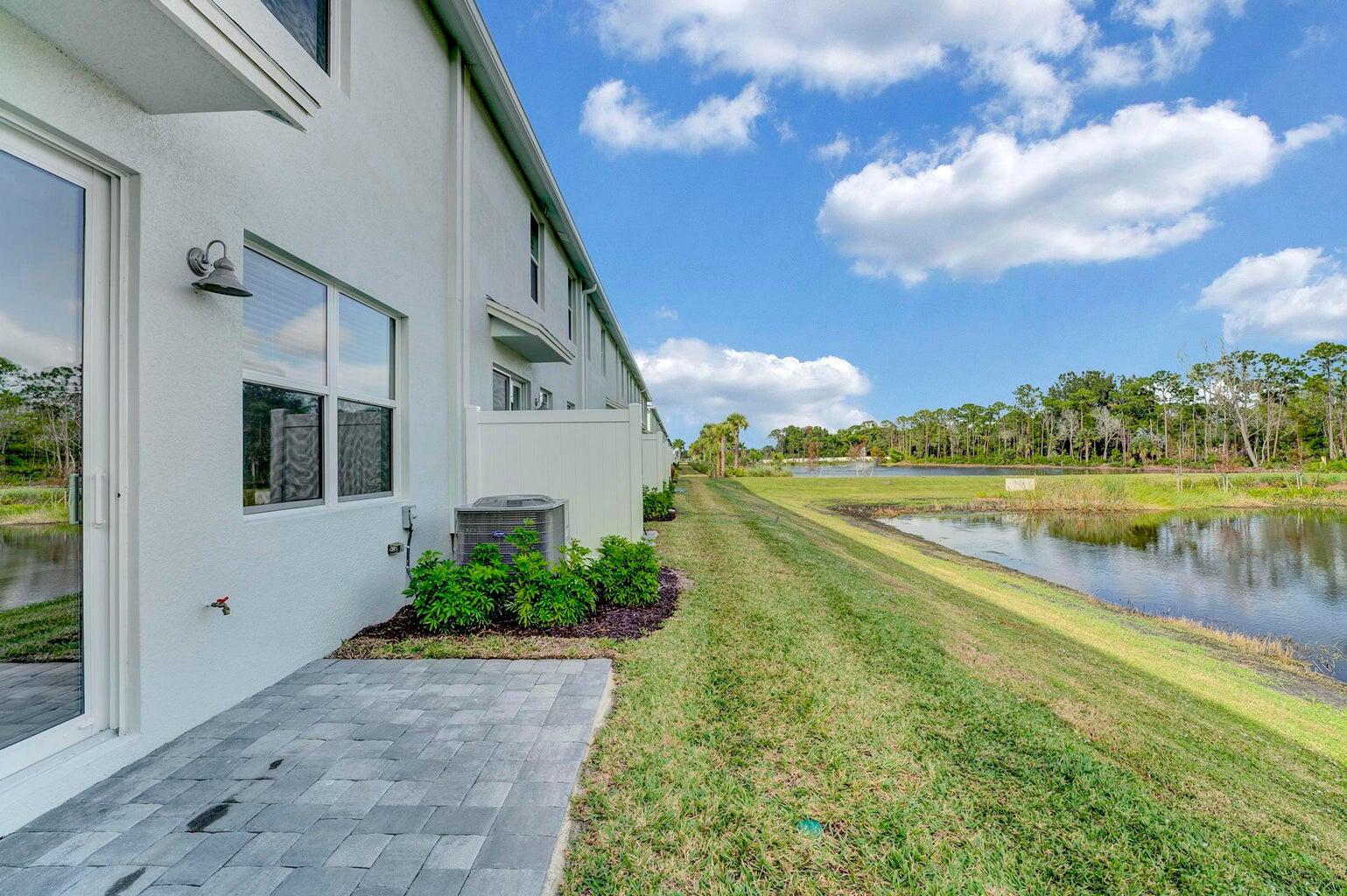 5748 Southeast Edgewater Circle Stuart, FL 34997 - Photo 22 of 36 backyard porch