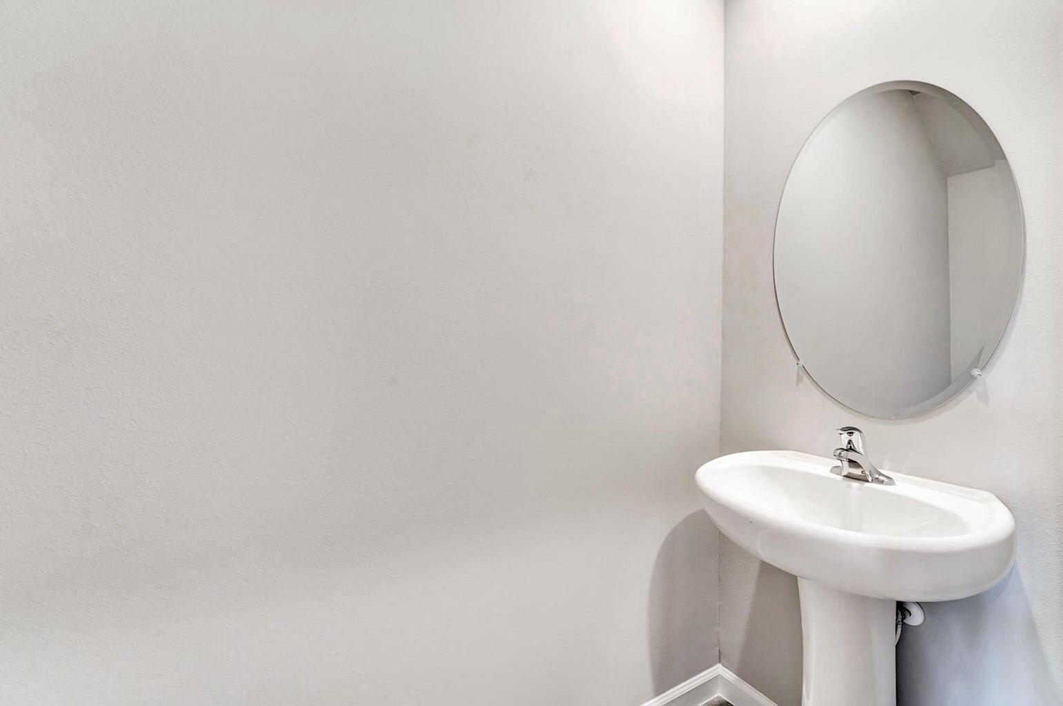 5748 Southeast Edgewater Circle Stuart, FL 34997 - Photo 8 of 36 Guest half bathroom downstairs