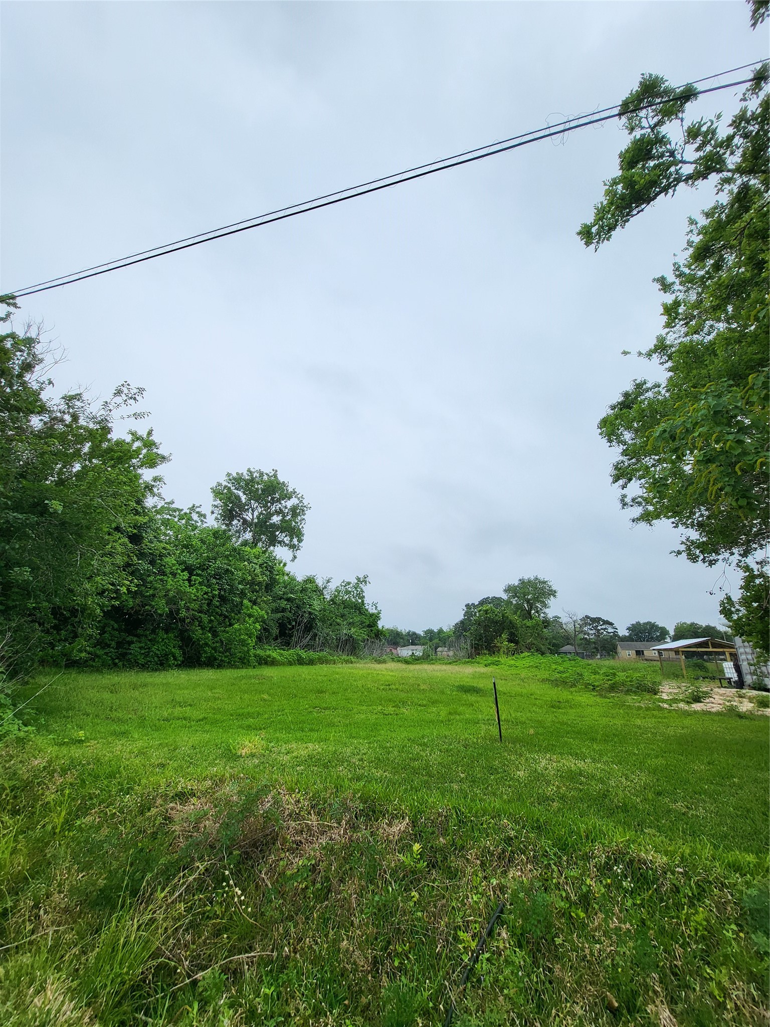 0 Kansas Street La Marque, TX 77568 - Photo 11 of 16 a backyard of a house with lots of green space
