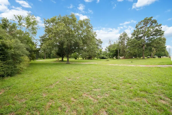 a view of a golf course with a garden