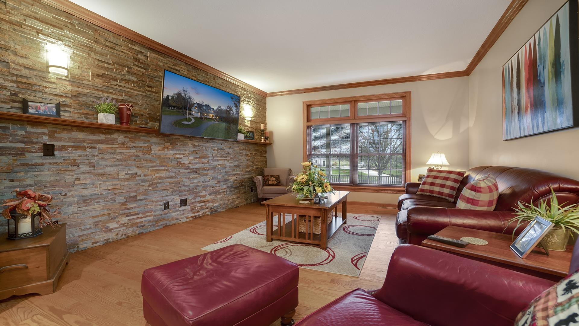 1921 Wildcat Road Dixon, IL 61021 - Photo 12 of 63 a living room with furniture wooden floor and a large window