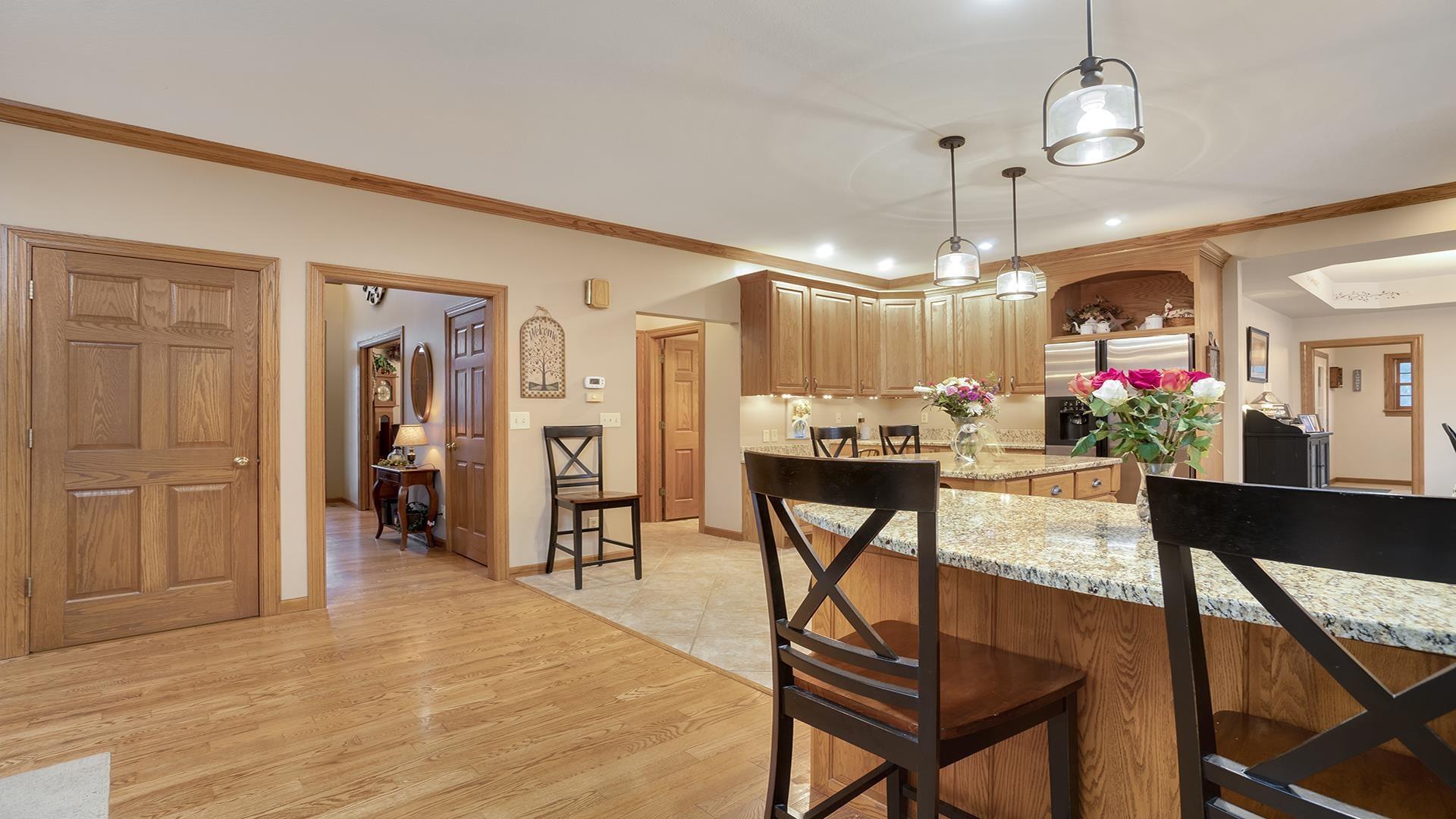 1921 Wildcat Road Dixon, IL 61021 - Photo 14 of 63 a view of a dining room with furniture and chandelier