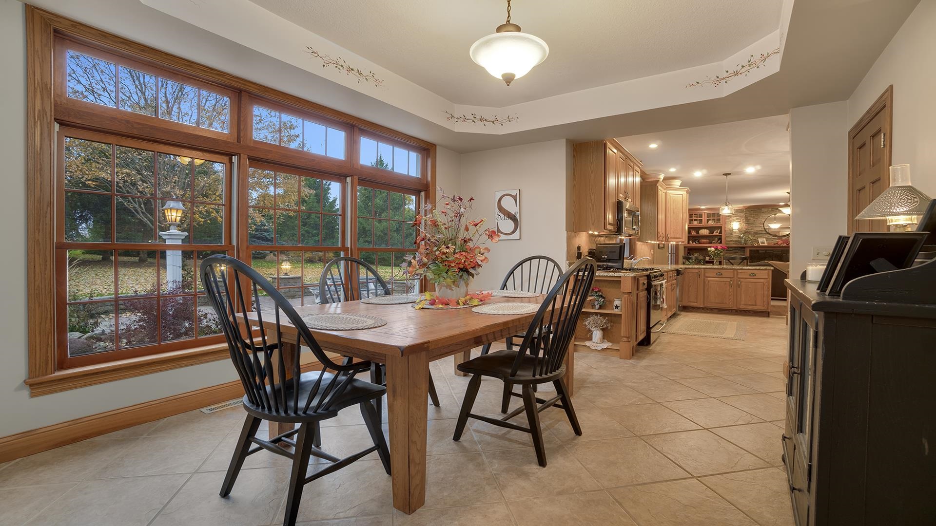 1921 Wildcat Road Dixon, IL 61021 - Photo 18 of 63 a view of a dining room with furniture window and outside view