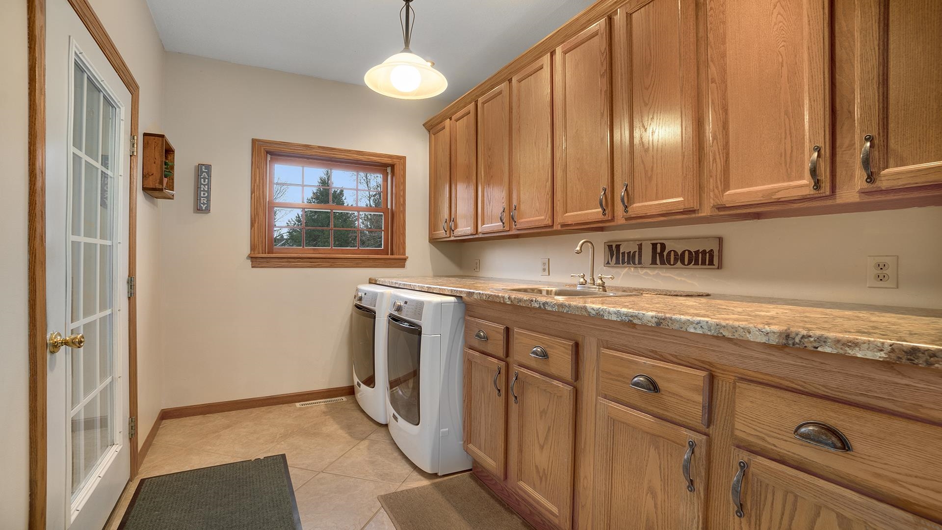 1921 Wildcat Road Dixon, IL 61021 - Photo 19 of 63 a kitchen with granite countertop a sink stainless steel appliances a counter space and cabinets