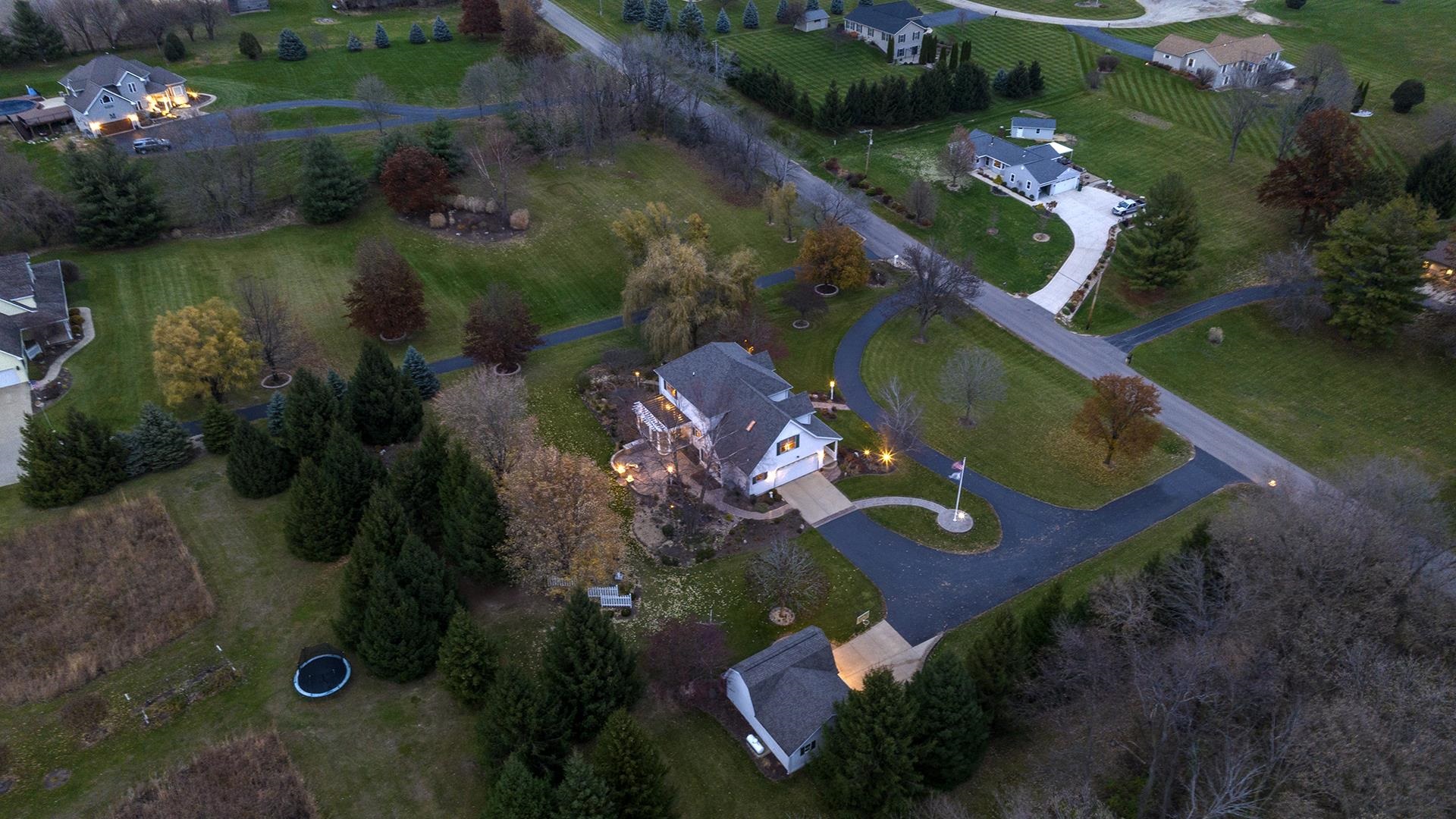 1921 Wildcat Road Dixon, IL 61021 - Photo 2 of 63 an aerial view of a house yard swimming pool and outdoor seating