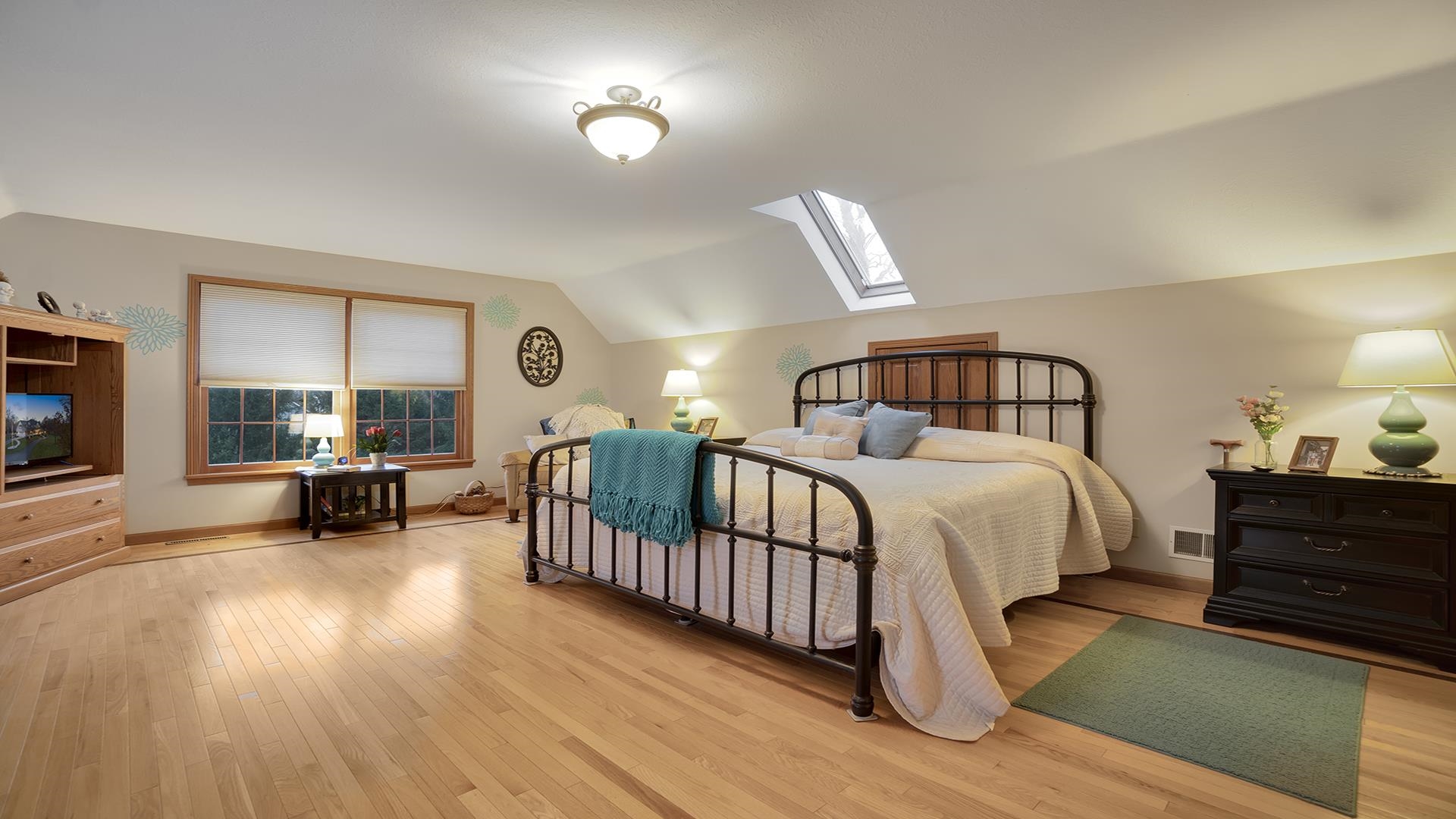 1921 Wildcat Road Dixon, IL 61021 - Photo 24 of 63 a bedroom with furniture and a fireplace